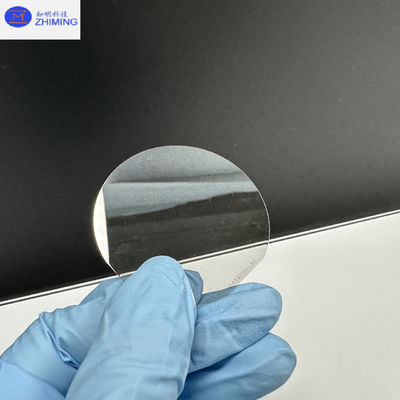 Wafer Karbida Silikon Ukuran Disesuaikan Semi isolasi Wafer SiC Hampir Tak Berwarna Transparan Tahan Tekanan Tinggi
